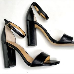 Ivana Trump black leather ankle strap sandals
